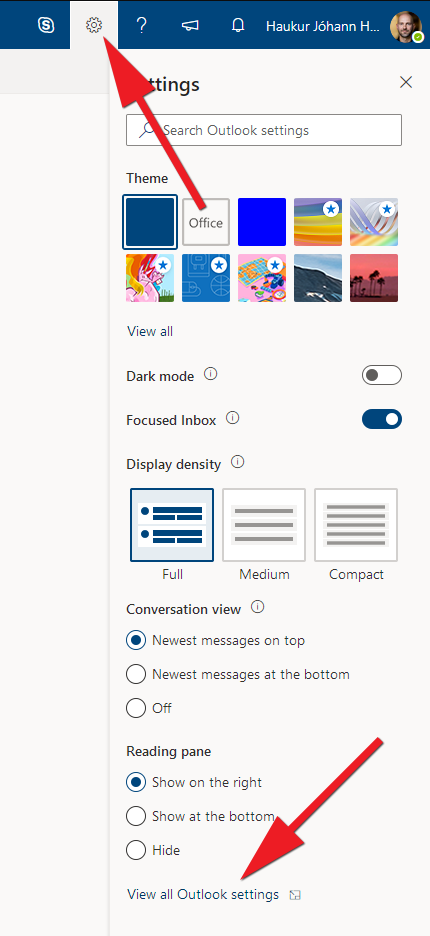 Click on the gear wheel in the top right corner, followed by "View all Outlook settings" at the bottom