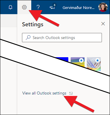 Click on the settings icon in the top right corner, followed by View all Outlook settings
